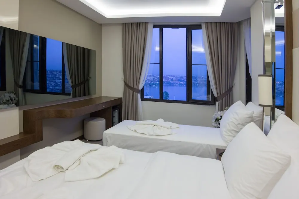 Deluxe Tek Büyük veya İki Ayrı Yataklı Oda, Deniz Manzaralı