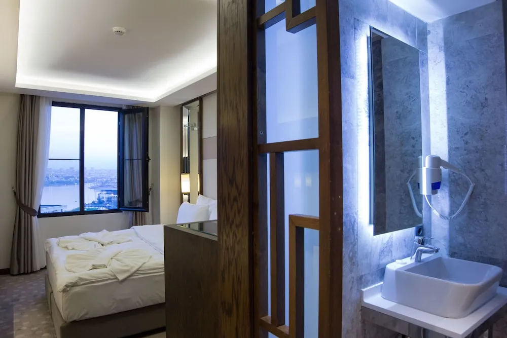 Deluxe Tek Büyük veya İki Ayrı Yataklı Oda, Deniz Manzaralı