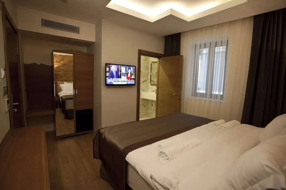 Deluxe Tek Büyük veya İki Ayrı Yataklı Oda