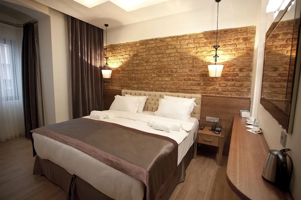 Deluxe Tek Büyük veya İki Ayrı Yataklı Oda