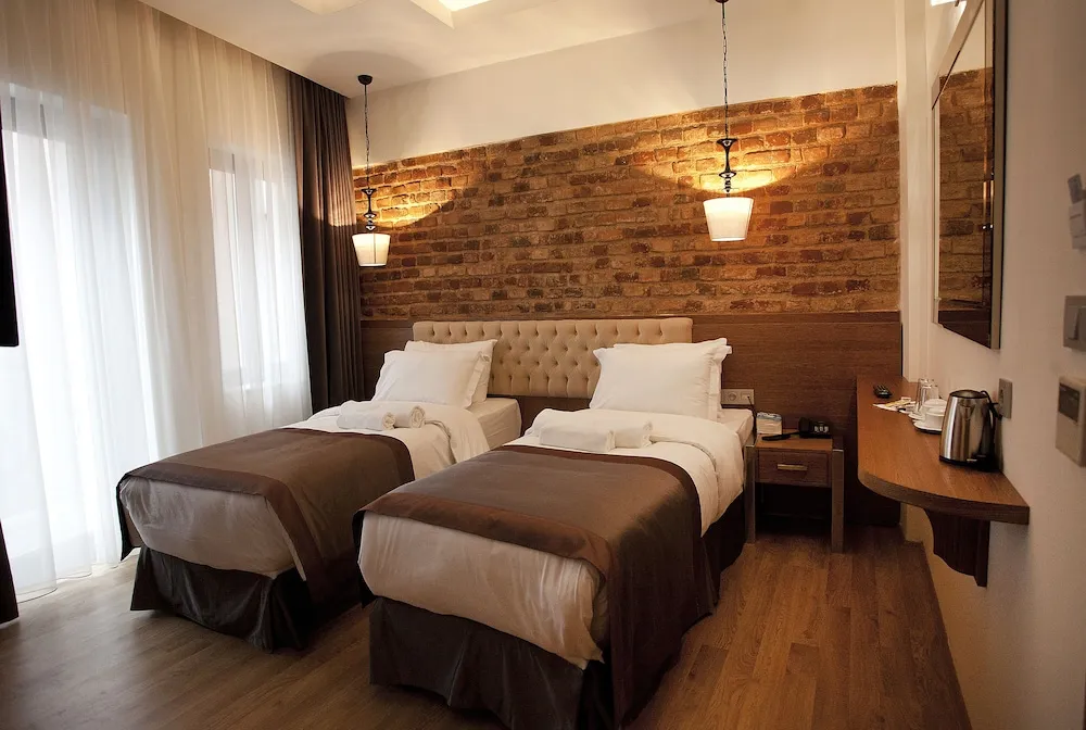 Deluxe Tek Büyük veya İki Ayrı Yataklı Oda