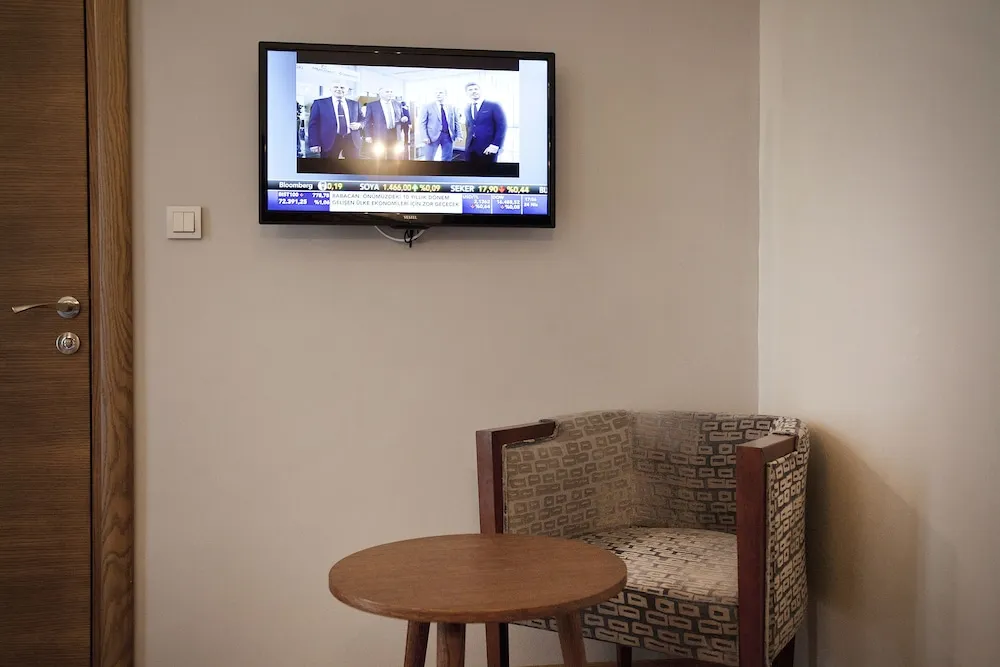 Deluxe Tek Büyük veya Iki Ayri Yatakli Oda Oturma Alanli