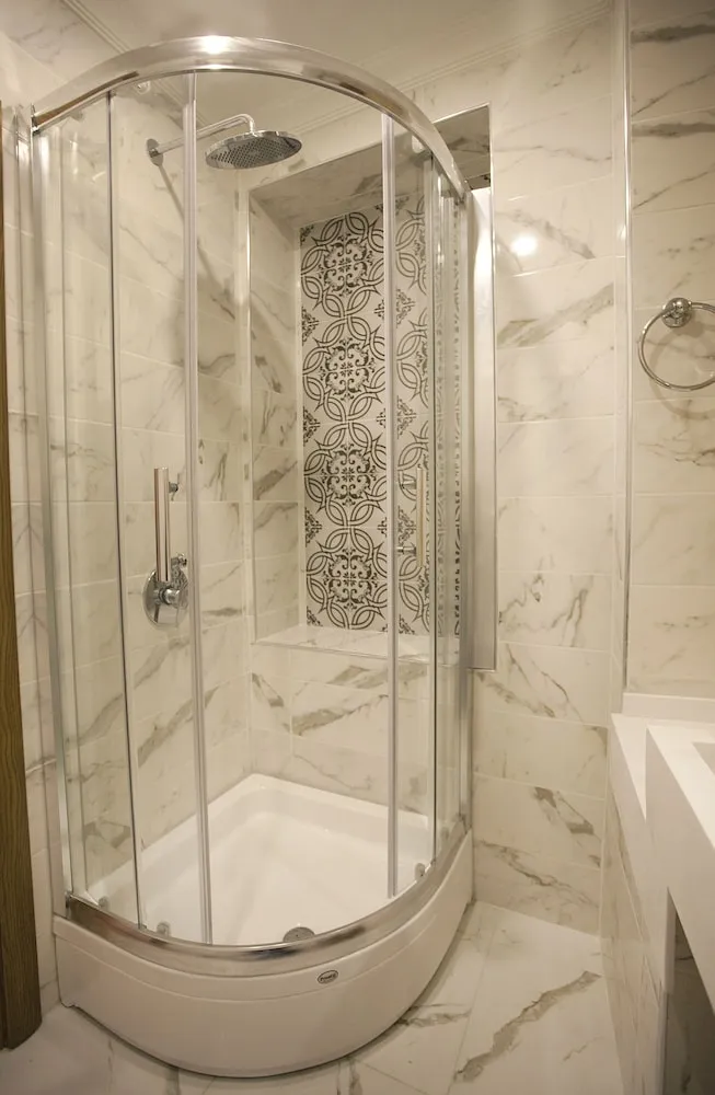 Deluxe Tek Büyük veya Iki Ayri Yatakli Oda Oturma Alanli