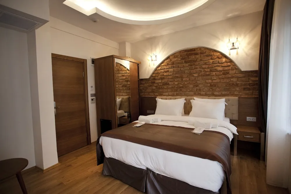 Deluxe Tek Büyük veya İki Ayrı Yataklı Oda, Balkon