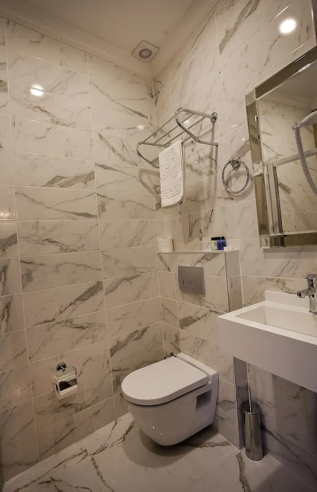 Deluxe Tek Büyük veya İki Ayrı Yataklı Oda, Balkon