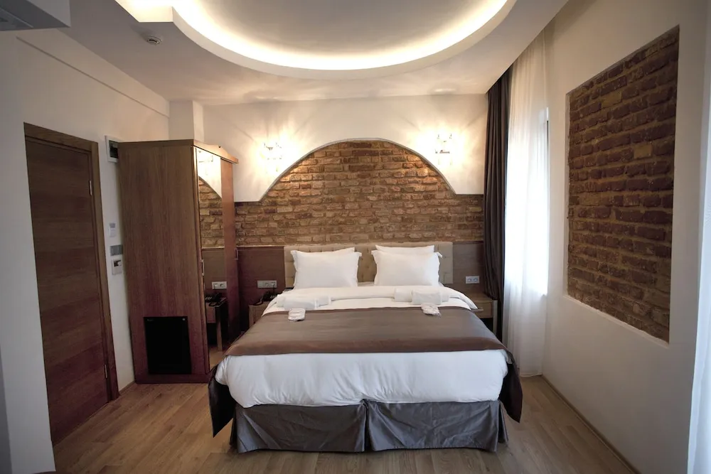 Deluxe Tek Büyük veya İki Ayrı Yataklı Oda, Balkon