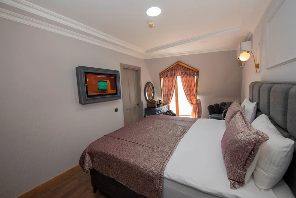 Deluxe Tek Büyük veya İki Ayrı Yataklı Oda, 1 Çift Kişilik veya 2 Tek Kişilik Yatak
