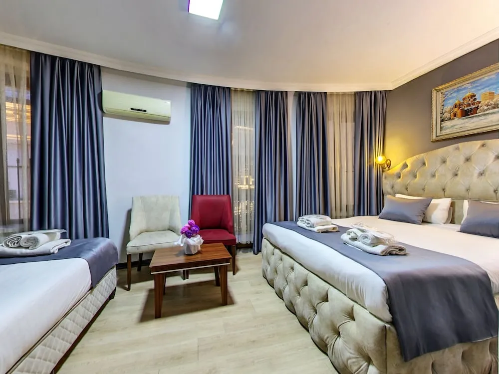 Deluxe Üç Kişilik Oda