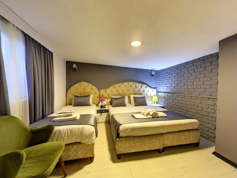 Deluxe Üç Kişilik Oda