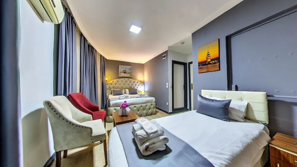 Deluxe Üç Kişilik Oda