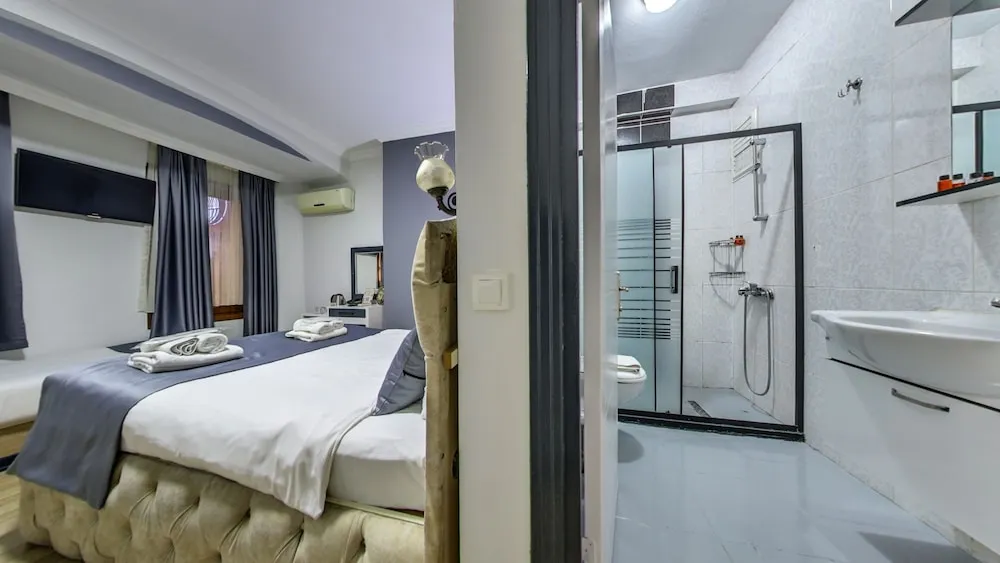 Deluxe Üç Kişilik Oda