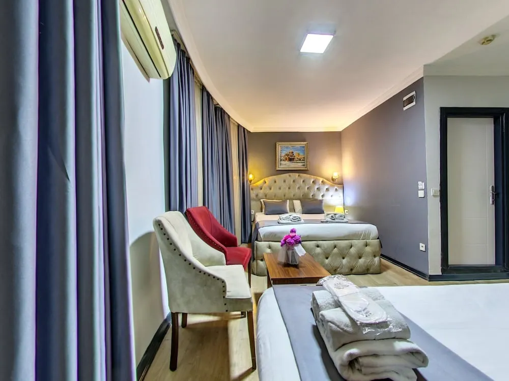 Deluxe Üç Kişilik Oda