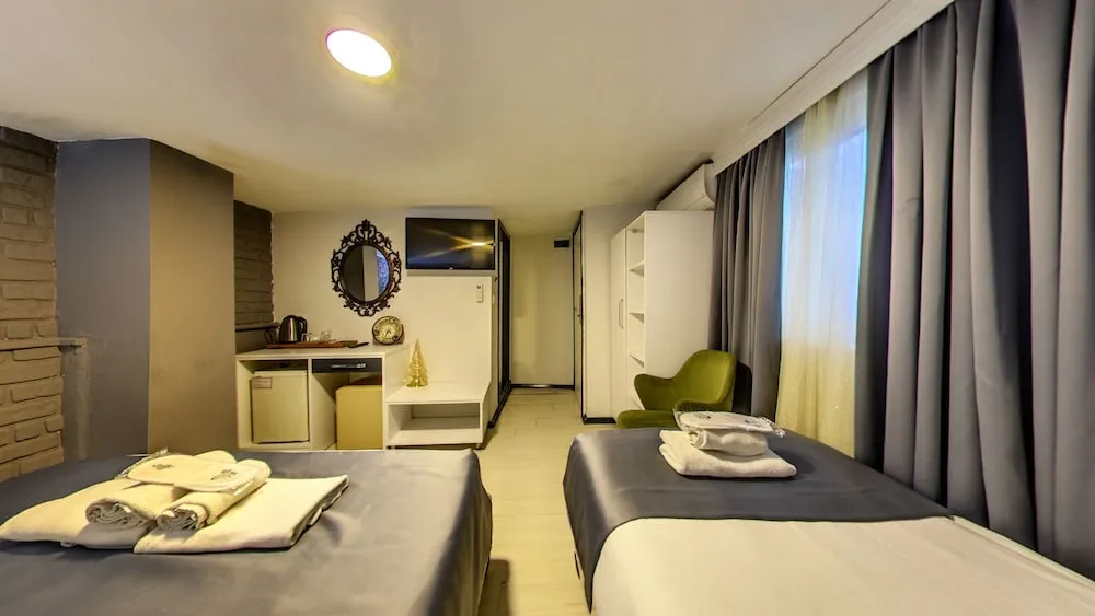 Deluxe Üç Kişilik Oda