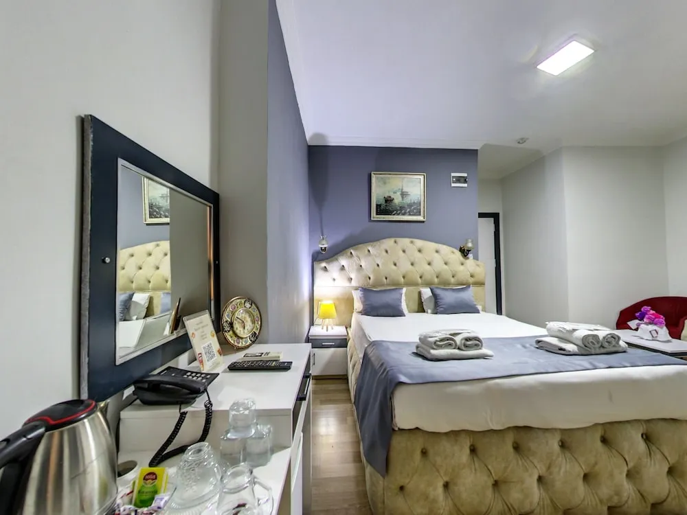 Deluxe Üç Kişilik Oda