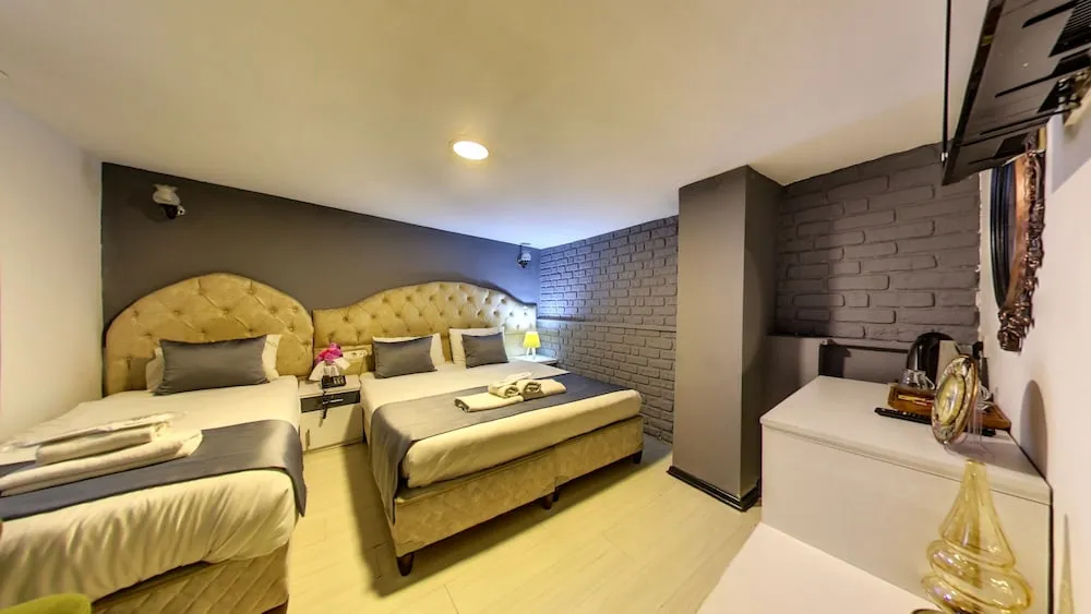 Deluxe Üç Kişilik Oda