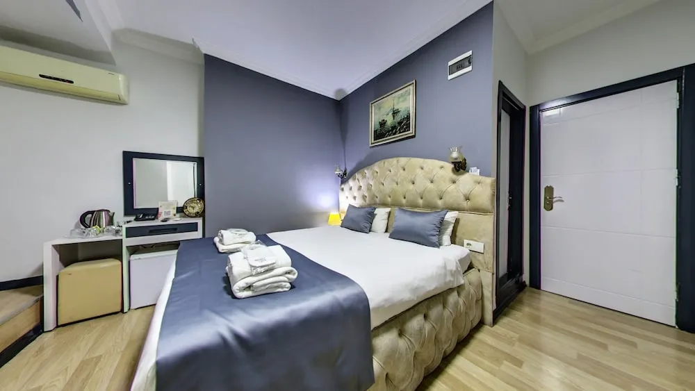 Deluxe Üç Kişilik Oda