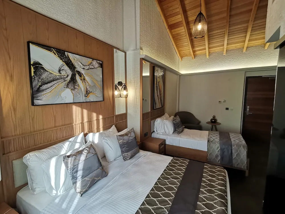 Deluxe Üç Kişilik Oda