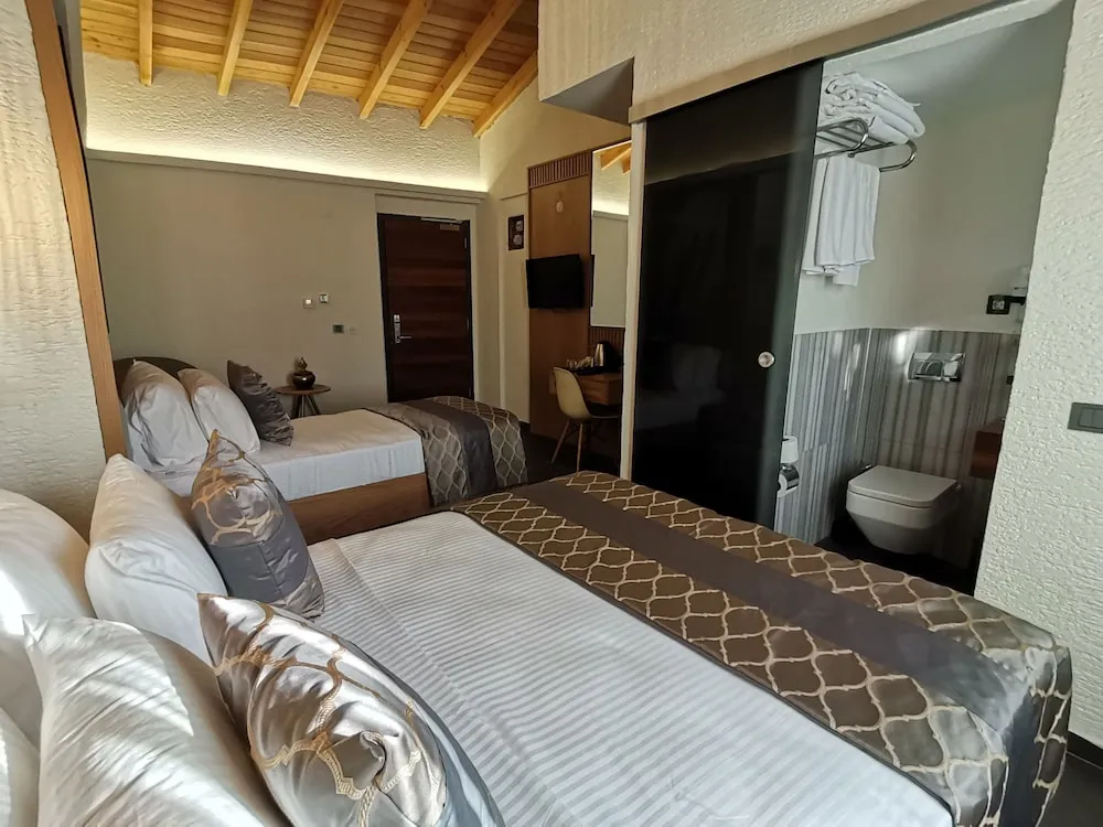 Deluxe Üç Kişilik Oda