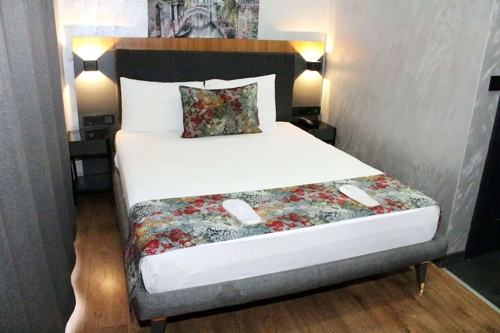 Deluxe Tek Büyük veya İki Ayrı Yataklı Oda