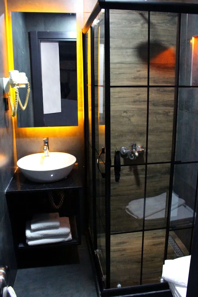 Deluxe Tek Büyük veya İki Ayrı Yataklı Oda