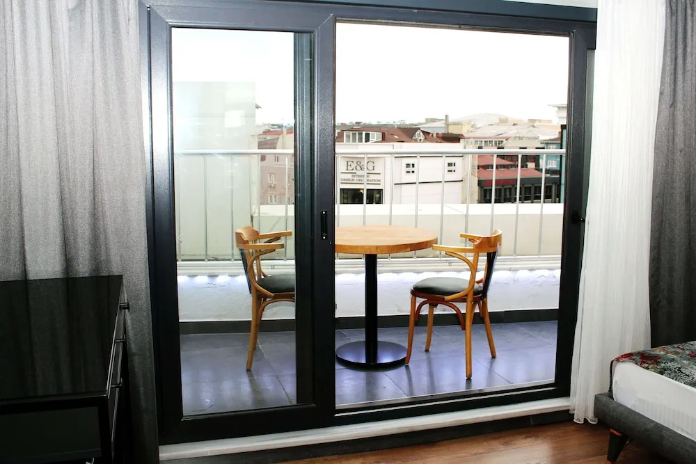 Deluxe Tek Büyük veya İki Ayrı Yataklı Oda