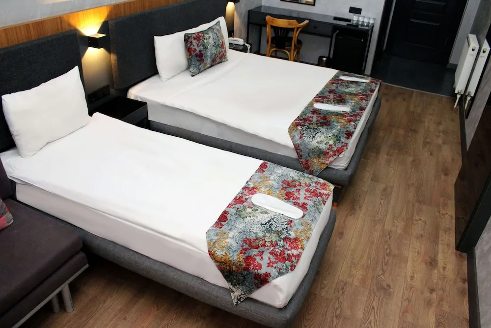 Deluxe Üç Kişilik Oda