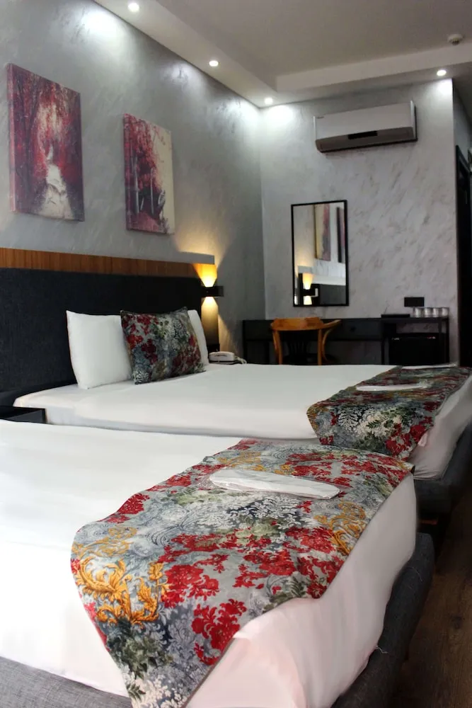 Deluxe Üç Kişilik Oda
