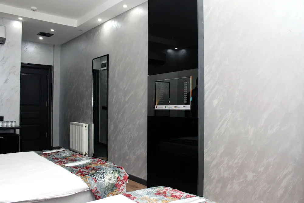 Deluxe Üç Kişilik Oda