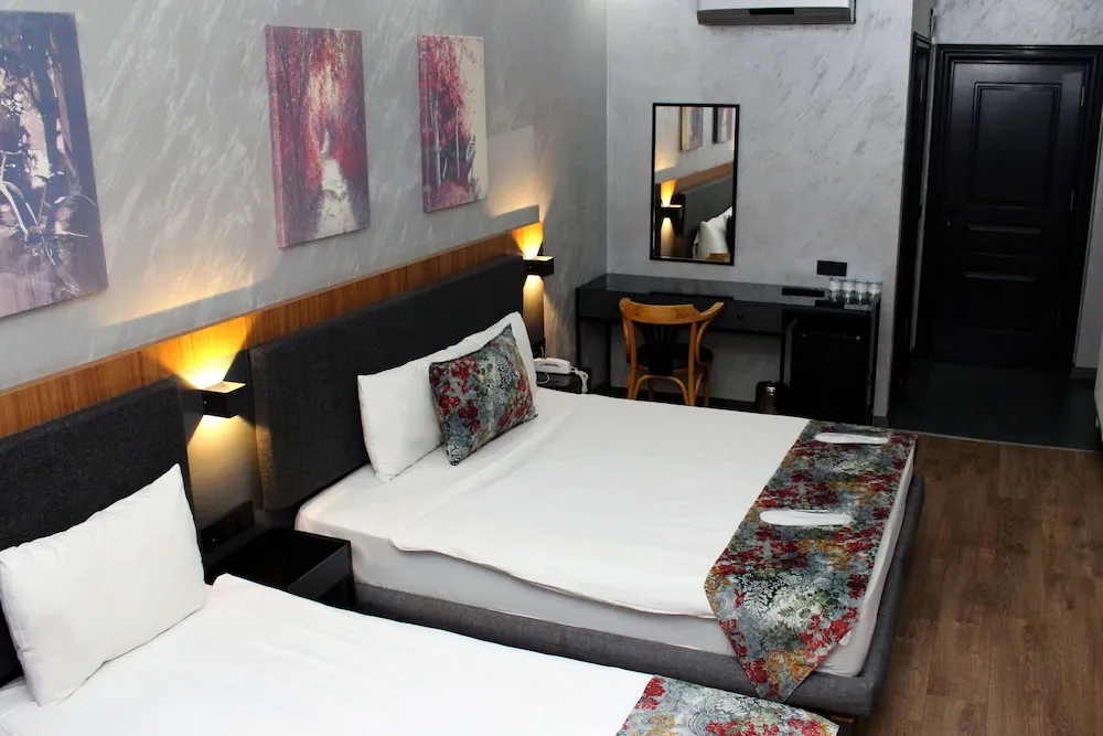 Deluxe Üç Kişilik Oda