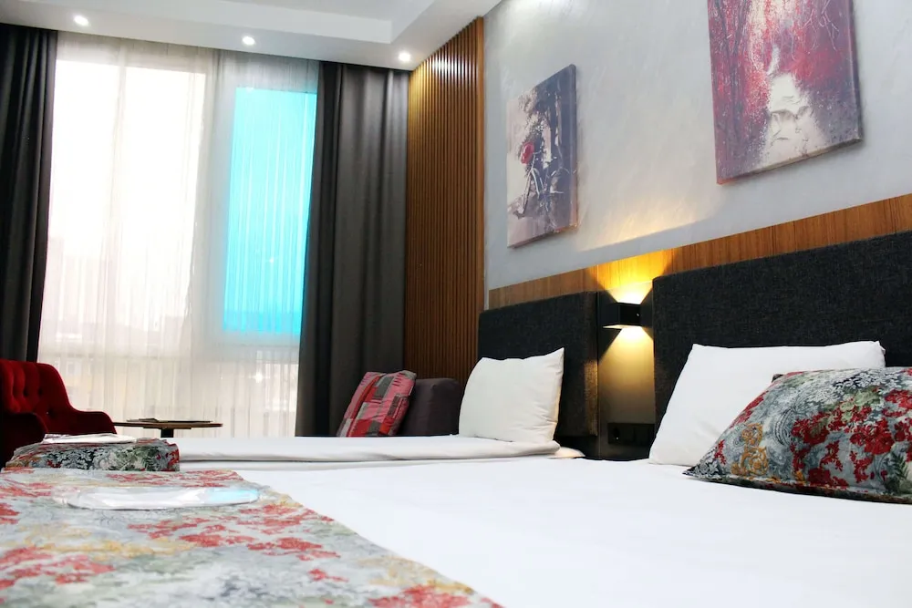 Deluxe Üç Kişilik Oda