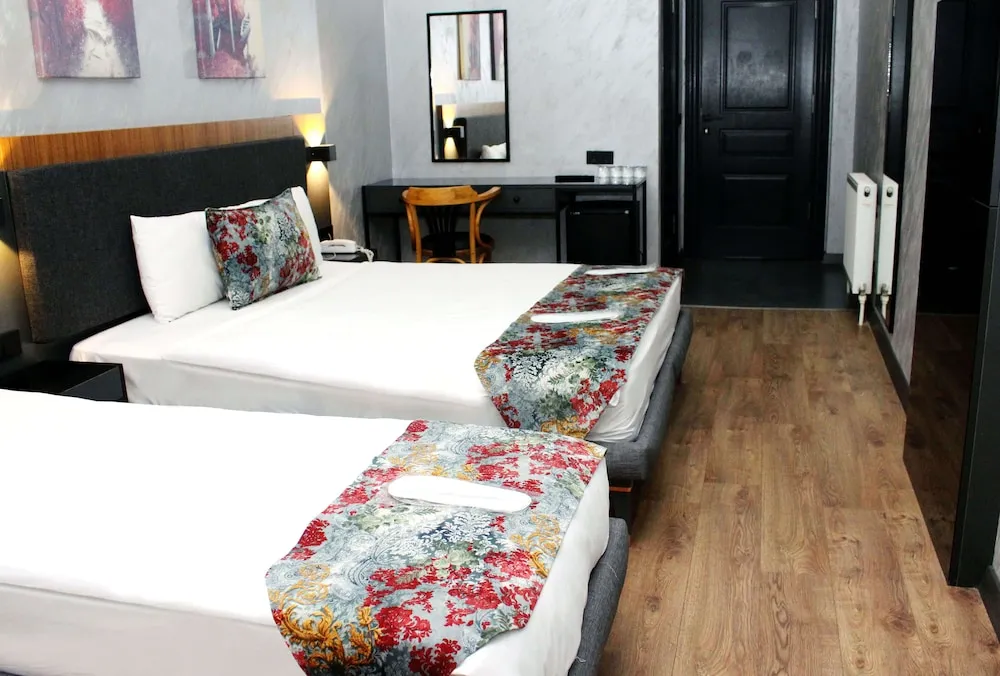 Deluxe Üç Kişilik Oda