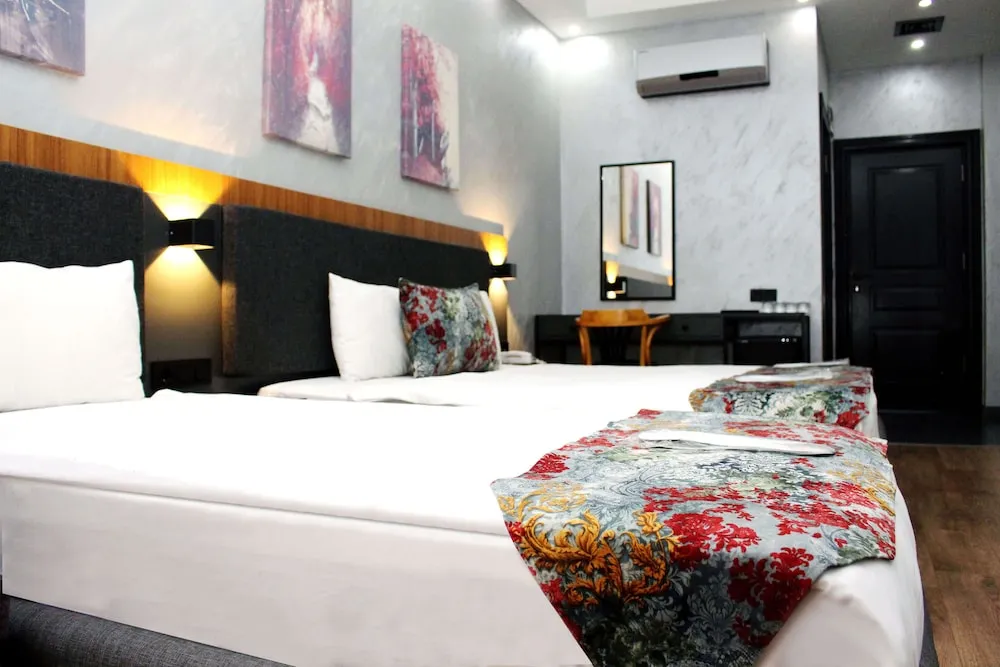 Deluxe Üç Kişilik Oda