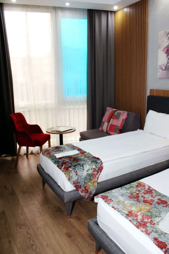 Deluxe Üç Kişilik Oda