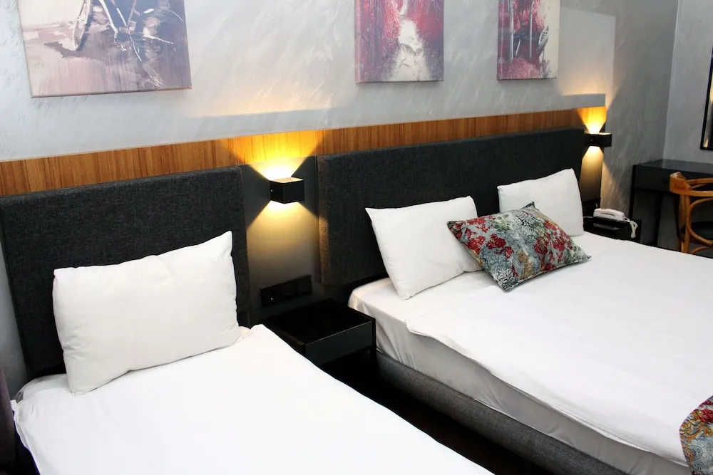 Deluxe Üç Kişilik Oda