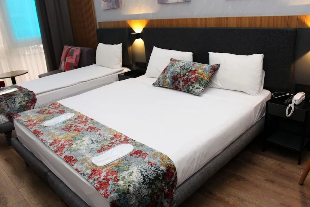 Deluxe Üç Kişilik Oda