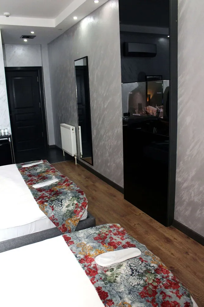 Deluxe Üç Kişilik Oda