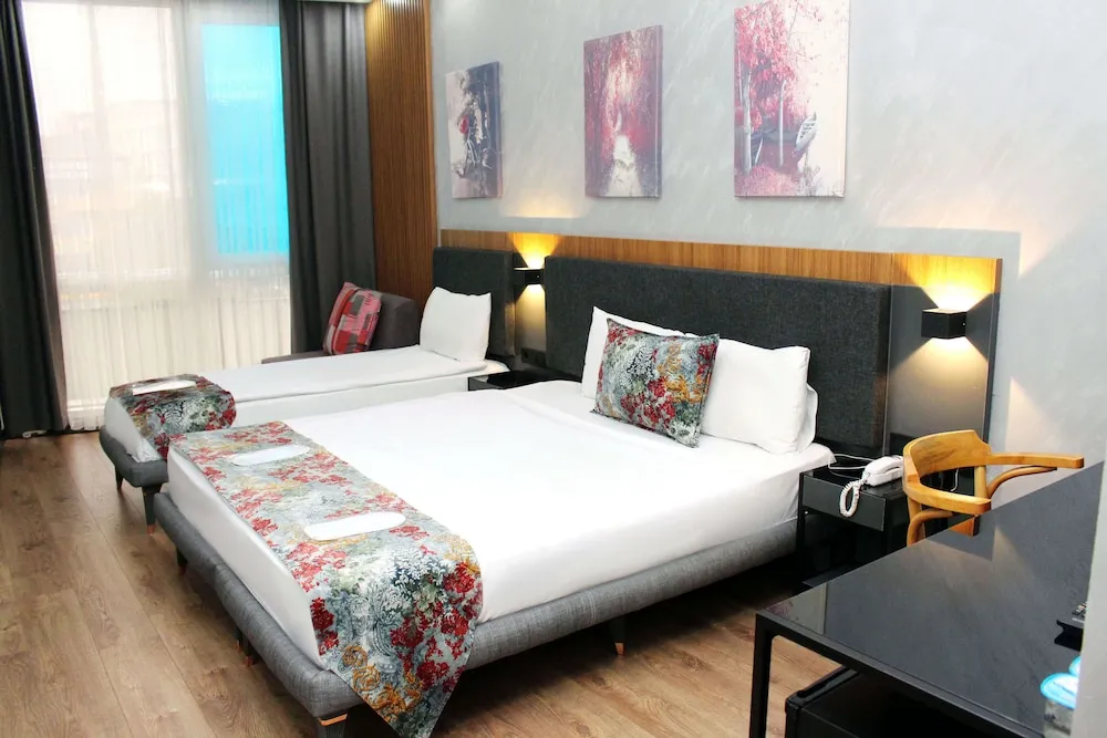 Deluxe Üç Kişilik Oda
