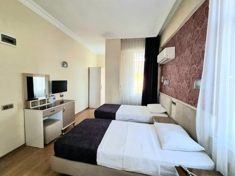 Deluxe Tek Büyük veya İki Ayrı Yataklı Oda