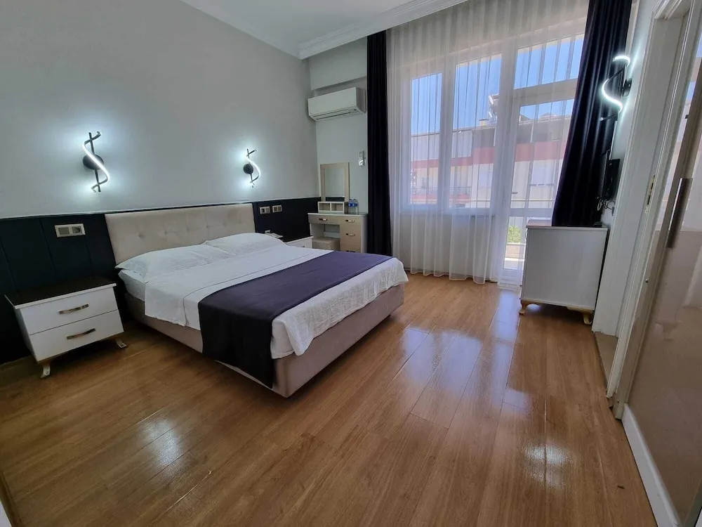 Deluxe Tek Büyük veya İki Ayrı Yataklı Oda