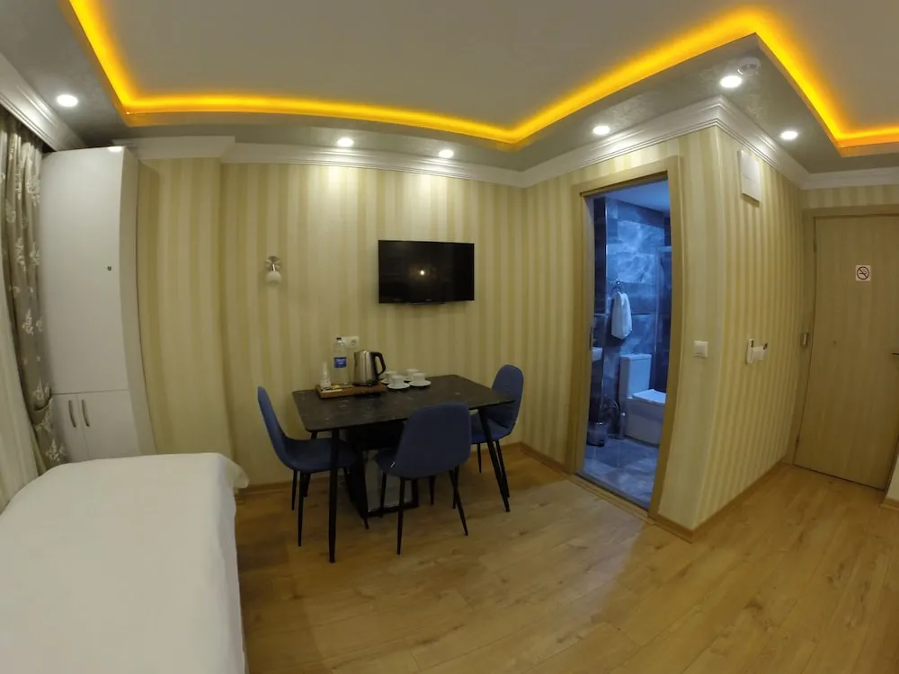 Deluxe Dört Kişilik Oda