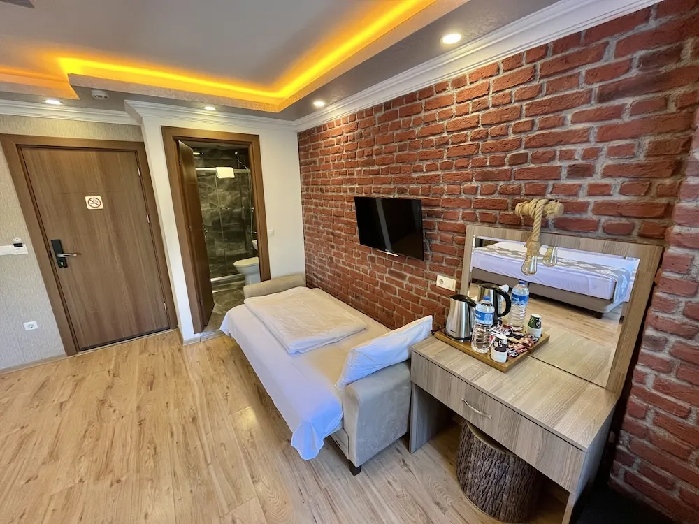 Deluxe Üç Kişilik Oda