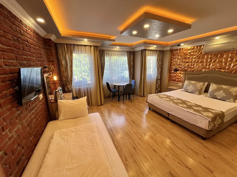 Deluxe Üç Kişilik Oda