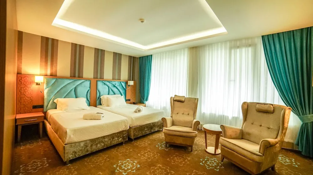 Deluxe Üç Kişilik Oda