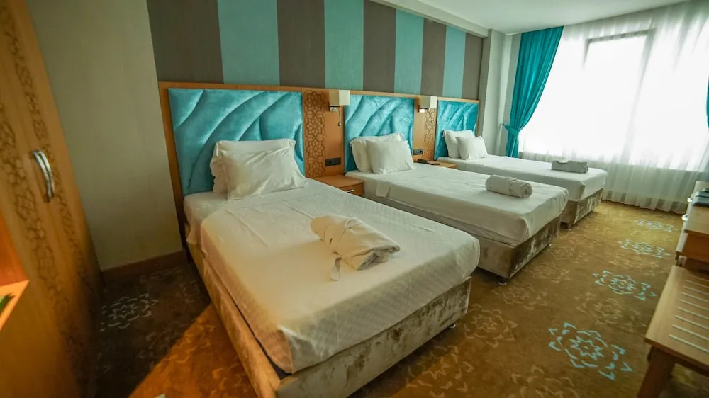 Deluxe Üç Kişilik Oda