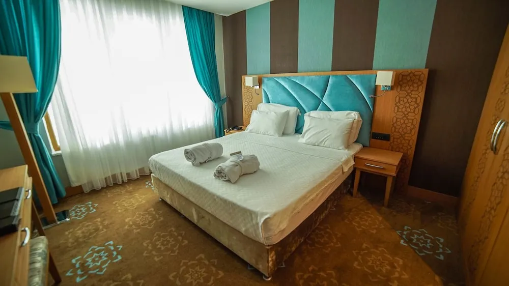 Deluxe Üç Kişilik Oda