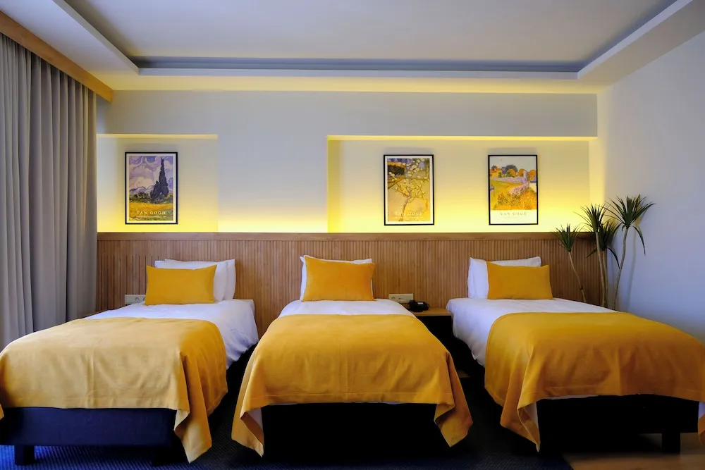 Grand Deluxe Triple Room