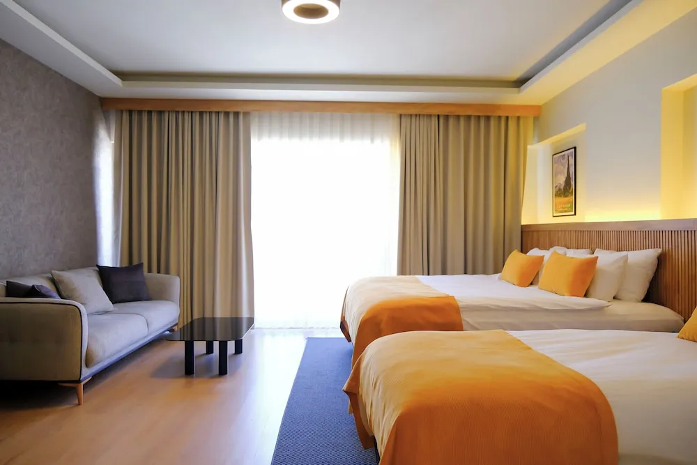 Grand Deluxe Triple Room