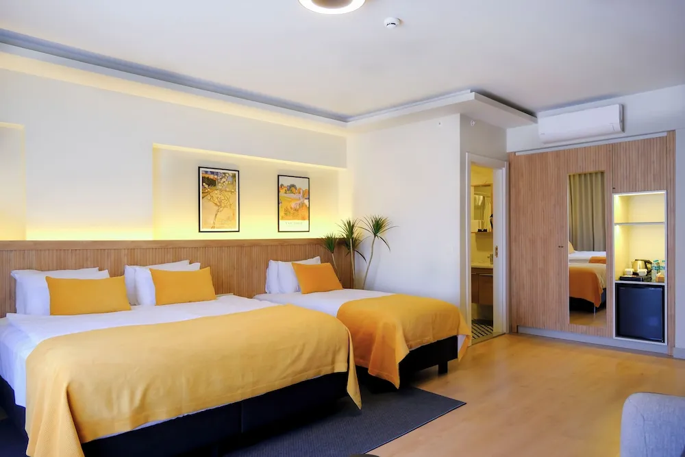 Grand Deluxe Triple Room