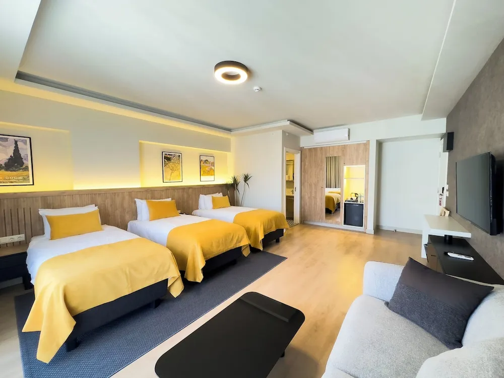 Grand Deluxe Triple Room