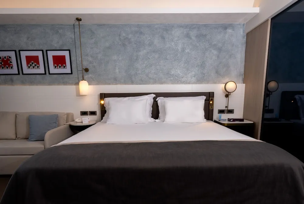 Deluxe Room Partial Sea View & Pool View 2 Adult + 2 Children